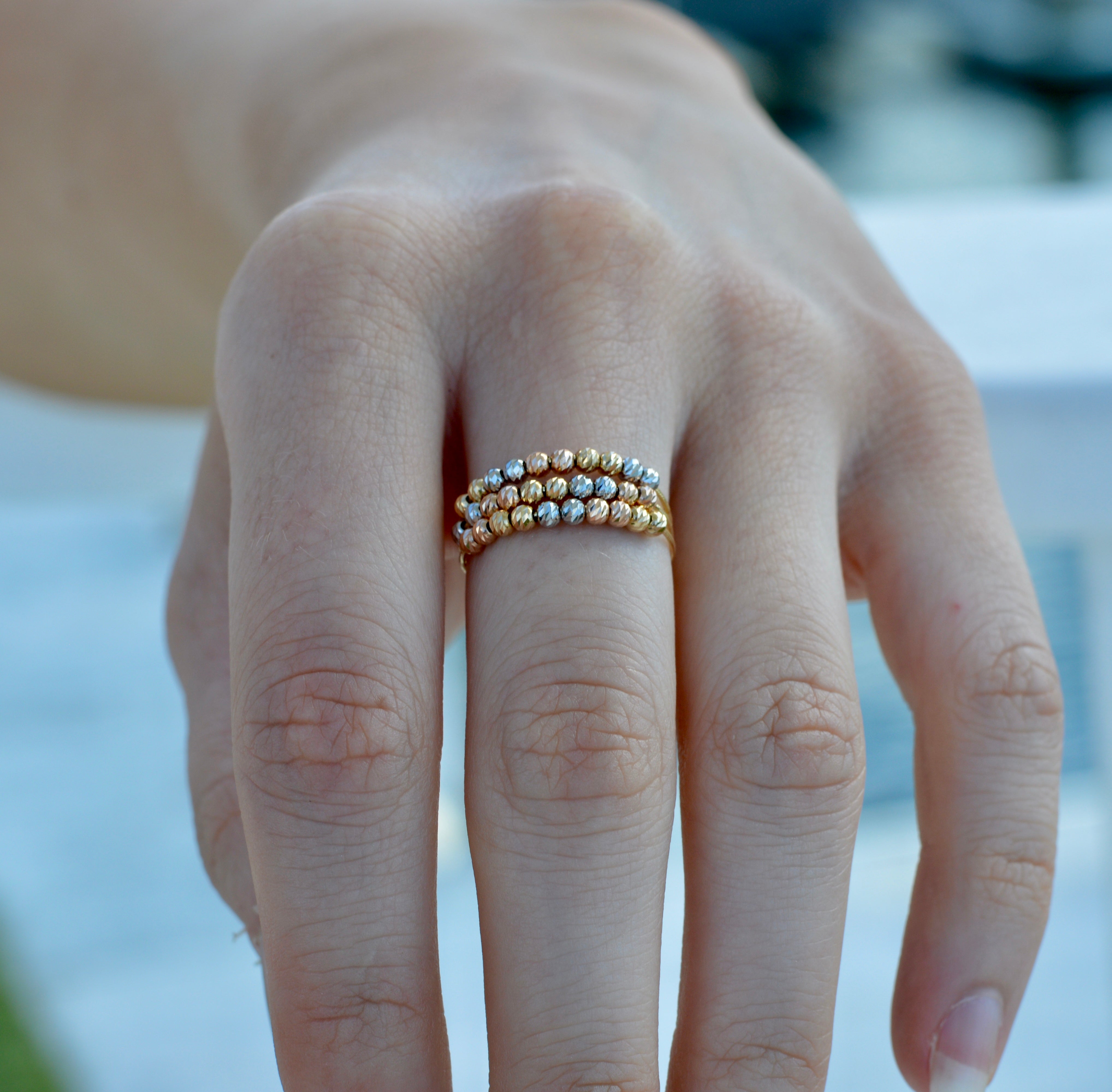 Flexi Magique Liberte - 18ct gold open back beaded ring in yellow gold, rose gold and platinum (flexi fit sizes L to X).