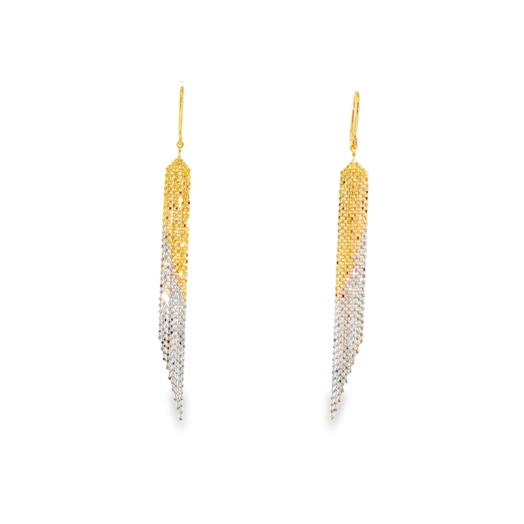 La Cascade Earrings in 18 carat yellow and white gold.